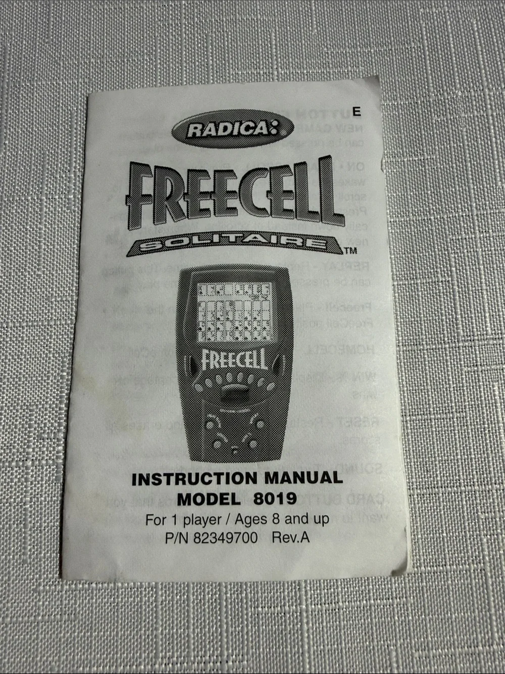 Radica FreeCell Handheld Electronic Game - Burgundy